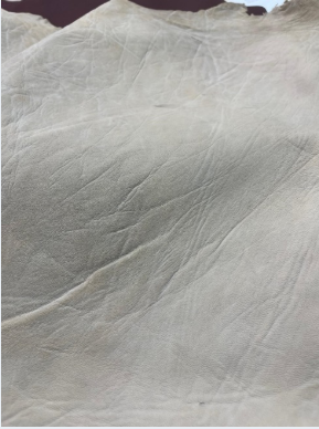 Genuine Sokoto™ crust leather fresh from the pits in Sokoto™, Nigeria. Ready to be retanned and colored. Note the natural, irregular river grain — no two skins are identical.

